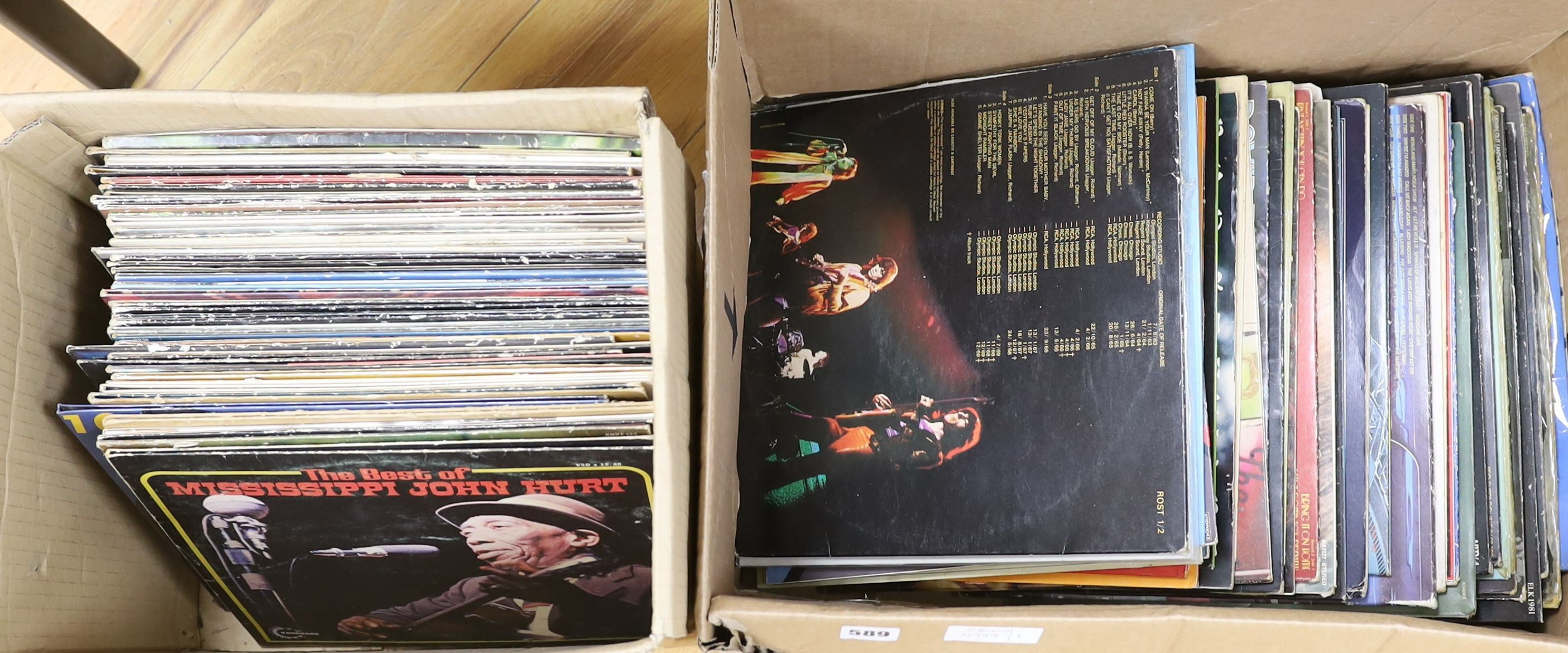 A collection of approximately 87 vinyl LPs to include The Beatles, David Bowie, Traffic, 10CC, Carly Simon etc